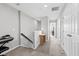 Upstairs hallway with carpeted floors, neutral walls, and convenient access to multiple rooms at 7916 Evergreen Creek Ct, Riverview, FL 33578