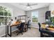 Bright office space with two desks, providing ample room for working and studying at 7916 Evergreen Creek Ct, Riverview, FL 33578