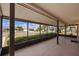 Spacious covered patio with a great view and plenty of room for outdoor seating at 828 Fox Hills Dr, Sun City Center, FL 33573