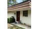 Charming front entrance with a well-kept garden and a secure ADT system at 8850 Dr Martin Luther King Jr N St # 8850, St Petersburg, FL 33702