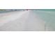 Beautiful white sand beach with crystal clear turquoise waters, perfect for relaxing at 9 Forbes Pl # 310, Dunedin, FL 34698
