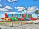 Colorful kayaks lined up on a sunny beach ready for a fun day on the water at 9 Forbes Pl # 310, Dunedin, FL 34698