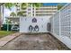Well-maintained car wash area for resident convenience with dual hoses and covered parking at 9 Forbes Pl # 310, Dunedin, FL 34698
