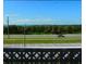 Beautiful view of the Gulf and surrounding palm trees and other lush plants at 9 Forbes Pl # 310, Dunedin, FL 34698