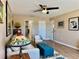 Comfortable living room featuring bright decor, natural lighting, and an inviting atmosphere at 100 Bluff View Dr # 115C, Belleair Bluffs, FL 33770