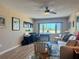 Versatile living space featuring a desk, comfortable seating, and natural light for a work/life balance at 100 Bluff View Dr # 115C, Belleair Bluffs, FL 33770