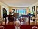 Cozy living room with a large window offering pleasant outdoor views and creating a bright atmosphere at 100 Bluff View Dr # 115C, Belleair Bluffs, FL 33770
