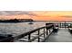 Scenic waterfront view featuring a bridge at sunset at 100 Bluff View Dr # 115C, Belleair Bluffs, FL 33770