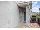 View of front door, with neutral paint, and exterior storage closet at 10966 Winter Crest Dr, Riverview, FL 33569