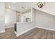 Kitchen featuring white upper cabinets, an island bar, and stainless steel appliances at 10966 Winter Crest Dr, Riverview, FL 33569