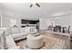 A spacious open-concept living area with a kitchen and dining area with hardwood floors at 11434 Leland Groves Dr, Riverview, FL 33579