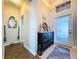 This inviting foyer area features stylish decor and a bright, airy atmosphere at 11614 Ashton Field Ave, Riverview, FL 33579