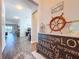 An inviting entryway features stylish decor and an open view into the living area at 11614 Ashton Field Ave, Riverview, FL 33579