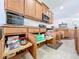 Kitchen features lots of cabinet space and handy pull-out storage shelves at 11614 Ashton Field Ave, Riverview, FL 33579