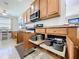 Kitchen features lots of cabinet space and handy pull-out storage shelves at 11614 Ashton Field Ave, Riverview, FL 33579