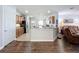 Open concept living space showing a modern kitchen and living room at 11614 Ashton Field Ave, Riverview, FL 33579