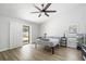 Bright bedroom with sliding door access to the outdoors and closet at 12546 108Th St, Largo, FL 33778