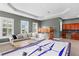 Bonus room boasts large windows, a seating area, wet bar and bunkbeds for the  at 131 Miramar Ne Blvd, St Petersburg, FL 33704