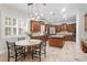Spacious kitchen featuring custom cabinets, stainless steel appliances, and a center island at 131 Miramar Ne Blvd, St Petersburg, FL 33704