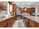 Well-equipped kitchen with custom cabinetry, stainless steel appliances, and granite countertops at 131 Miramar Ne Blvd, St Petersburg, FL 33704