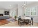 Open-concept kitchen and breakfast nook with hardwood floors and natural light at 131 Miramar Ne Blvd, St Petersburg, FL 33704