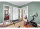 View of office reveals wood floors, neutral paint and easy access to the bath and stairwell at 131 Miramar Ne Blvd, St Petersburg, FL 33704