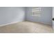 Neutral bedroom with window and tile flooring at 14164 Fennsbury Dr, Tampa, FL 33624