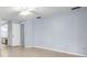 Spacious bedroom with tile floors and adjacent bathroom at 14164 Fennsbury Dr, Tampa, FL 33624