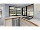 Kitchen sink and counter looking out to the pool and patio area at 14164 Fennsbury Dr, Tampa, FL 33624