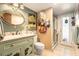 Bathroom showcasing a stylish vanity with unique fixtures and a decorative mirror at 159 Canby Cir, Spring Hill, FL 34606