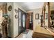 Inviting foyer with tiled flooring, decorative accents, and a glimpse into the adjacent room, creating a warm and welcoming entrance at 159 Canby Cir, Spring Hill, FL 34606