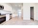 Modern kitchen with stainless steel appliances, granite countertops, and tile floors that provides a sleek and functional design at 16425 66Th E Ln, Parrish, FL 34219