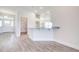 A bright kitchen has an eat-in breakfast bar with granite countertop, and a modern faucet at 16425 66Th E Ln, Parrish, FL 34219