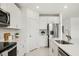 Well-equipped kitchen with stainless steel appliances and lots of counter space at 1829 Draughton Dr, Zephyrhills, FL 33541