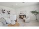 Serene living room with modern furnishings and soft lighting at 1829 Draughton Dr, Zephyrhills, FL 33541