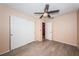 Comfortable bedroom with hardwood floors, closet, ceiling fan and updated trim throughout at 2020 58Th N Way, Clearwater, FL 33760