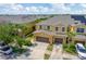 Bird's-eye view of attractive townhomes with 2 car garages and manicured surroundings, solar panels, near a lake at 2022 Hawks View Dr, Ruskin, FL 33570