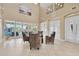 Lounge area with high ceilings, large windows, and modern decor at 2022 Hawks View Dr, Ruskin, FL 33570