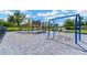 Community playground featuring slides, swings, and play structures at 2022 Hawks View Dr, Ruskin, FL 33570