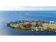 Beautiful waterfront homes with private docks on a scenic coastline at 26 Harborpointe Dr, Port Richey, FL 34668