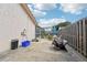 Enclosed backyard features a patio area and partial view of the screened-in pool at 2714 Witley Ave, Palm Harbor, FL 34685