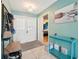 Bright entryway with tile floors, double doors, and a view into the bedrooms at 2714 Witley Ave, Palm Harbor, FL 34685