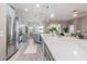 Stylish kitchen featuring stainless steel appliances, a large island, and plenty of cabinet space at 2957 Hickory Grove Dr, Valrico, FL 33596