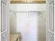Empty closet featuring a wire rack, wooden support beam, and white paneled doors at 3824 Duke Firth St, Land O Lakes, FL 34638