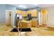 Updated kitchen featuring a spacious island, stainless steel appliances, and plenty of counter space at 3824 Duke Firth St, Land O Lakes, FL 34638