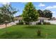 Charming single-story home with a well-maintained lawn and mature trees in a peaceful residential neighborhood at 3839 18Th N Ave, St Petersburg, FL 33713
