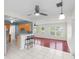 Open floor plan showcasing the kitchen with a breakfast bar flowing into the living area at 3839 18Th N Ave, St Petersburg, FL 33713