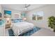 Serene main bedroom with beach-themed decor, natural light, and comfortable furnishings at 3839 18Th N Ave, St Petersburg, FL 33713