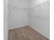 Walk-in closet with built in shelving at 4020 Via Sienna Cir, Sarasota, FL 34243