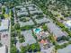 Aerial view of apartments and community pool surrounded by lush landscaping at 4207 S Dale Mabry Hwy # 2105, Tampa, FL 33611